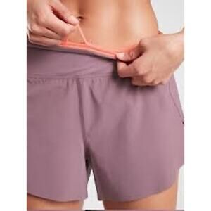 Athleta Run With 3 inch shorts mauve and pink